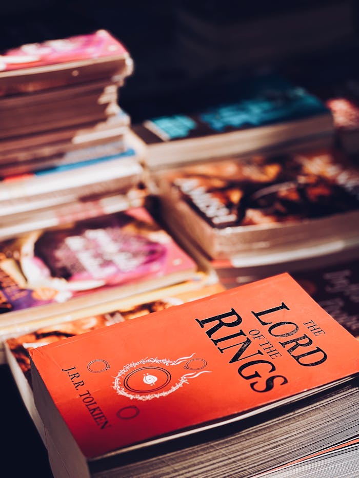 Close-up of a stack of books with The Lord of the Rings prominently displayed in a bookstore.